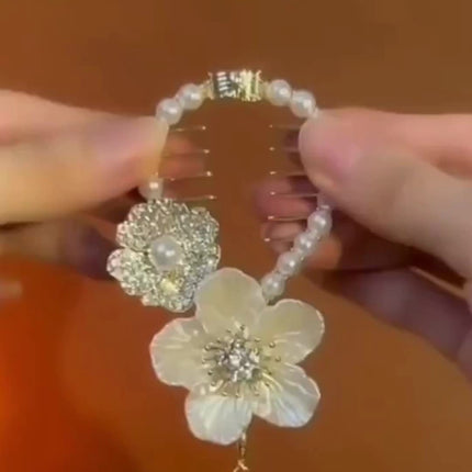 Camellia Tassel Ponytail Clip