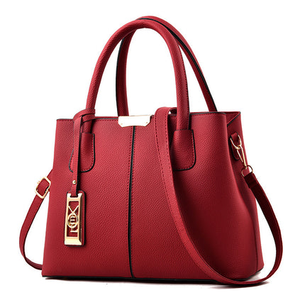 Chic Handbag with Metal Charm